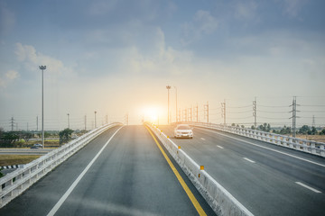 Car Driving on Highway Road And Blue Sky Background,Transportation concept