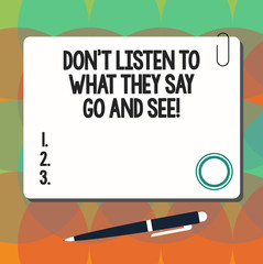 Conceptual hand writing showing Don T Listen To What They Say Go And See. Business photo showcasing Confirm Check by yourself Square Color Board with Magnet Click Ballpoint Pen and Clip