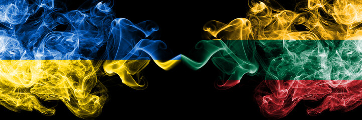 Ukraine, Lithuania competition thick colorful smoky flags. European football qualifications games