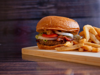 Homemade Bacon Cheese Burger with Onion Rings and Spicy French Fries