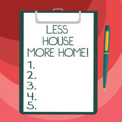 Text sign showing Less House More Home. Conceptual photo Have a warm comfortable place to live with family love Blank Sheet of Bond Paper on Clipboard with Click Ballpoint Pen Text Space