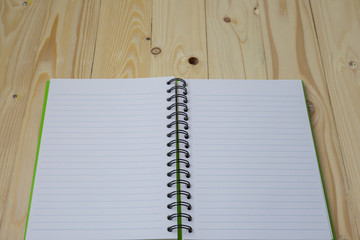 Blank recipe book on textured wood