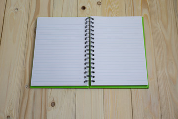 Blank recipe book on textured wood