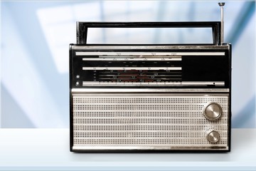 Old retro radio  on background