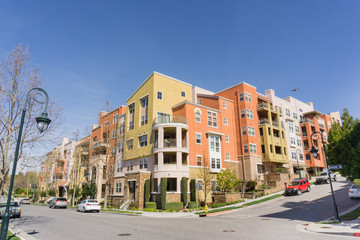 Naklejka na ściany i meble Residential multifamily building situated on a corner on top of telecommunication hill, San Jose, California