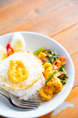 stir fried curry with shrimp and fried egg
