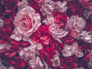 beautiful artificial flowers background, vintage style;