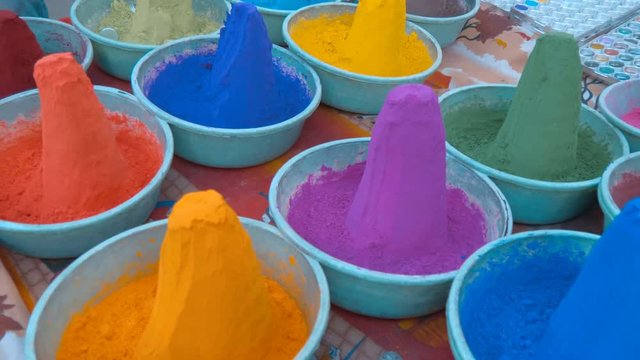 Indian traditional natural dyes of different colors are very bright and saturated. Shot in motion
