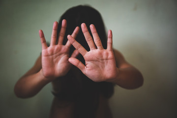 Women bondage lift hands against violence against women, international women's day.