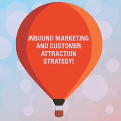 Obraz premium Text sign showing Inbound Marketing And Customer Attraction Strategy. Conceptual photo Promote your product Three toned Color Hot Air Balloon afloat with Basket Tied Hanging under it