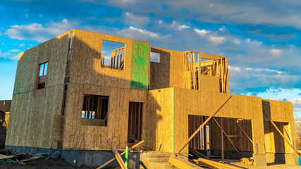 Panorama Framework of a house under construction viewed on a bright sunny day