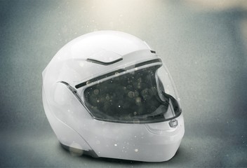 White motorcycle helmet and abstract bokeh light
