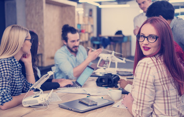 redhead business woman learning about drone technology