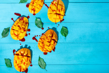 Mexican snack: Cutted tropical mango fruit with chilli 