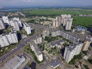 Fototapeta premium Modern residential area of Kiev at summer time (drone image). Ukraine