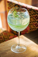summer cocktal with cucumber and lemon