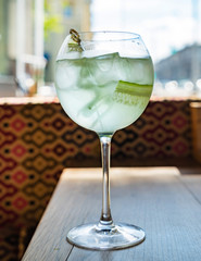 summer cocktal with cucumber and lemon