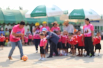 crowd of people walking in motion