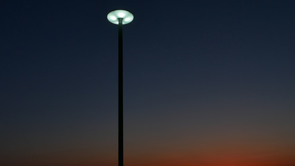 Fototapeta na wymiar street lamp on blue background