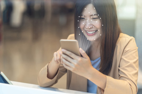 Asian women using the technology tablet for access control by face recognition in private identification step when online shopping with the credit card, credit card mockup, online payment concept
