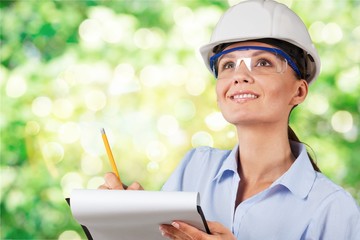 Portrait of young student of architecture  on background