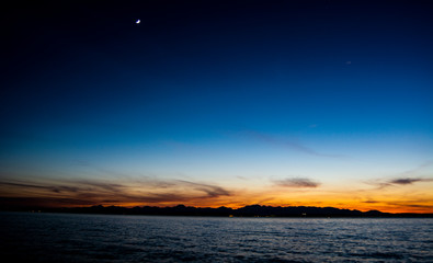 Obraz premium Sunset Mountains Moon