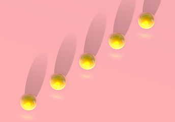 Abstract pink background with golden ball jumping in top view unusual perspective