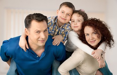 Fototapeta premium Beautiful smiling Lovely family indoors