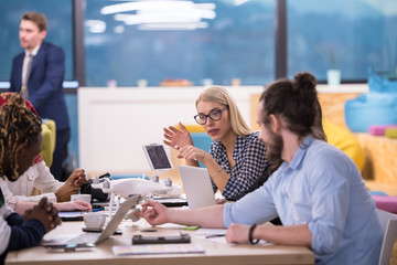 multiethnic business team learning about drone technology