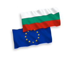 Obraz premium National vector fabric wave flags of Bulgaria and European Union isolated on white background. 1 to 2 proportion.