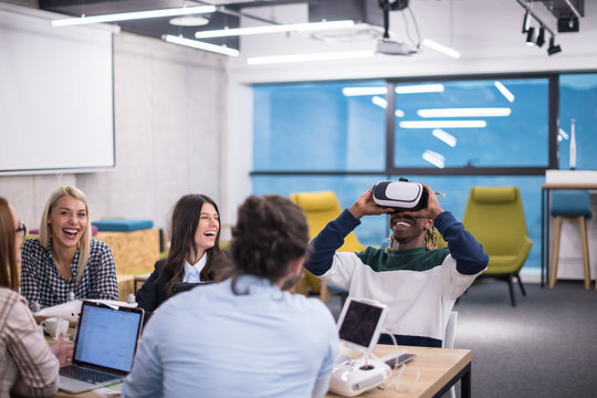 Young Multiethnic Business team using virtual reality headset - Powered by Adobe