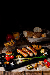 Delicious  grilled sausage with various grilled vegetables