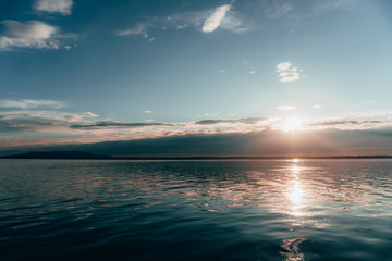 Sunset over the Seawater with Beautiful clouds