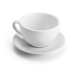 Empty cup and saucer isolated on white with clipping path