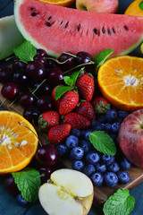 Fresh fruits on wooden background, Healthy diet.