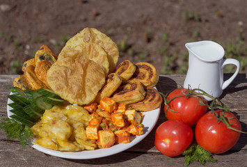 Plate of food, traditional homemade with milk