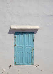 The typical blue windows found in Essaouira, Morocco