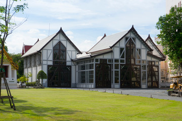 The exterior view of the National Museum with green grass lawn in Bangkok,Thailand 