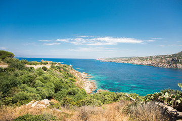 Fototapeta na wymiar Landscape with Sea, Stones, Road and Coast of Santa Teresa di Gallura in North Sardinia Island.