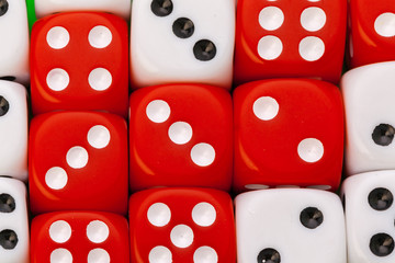 Rolling dice on a wooden desk