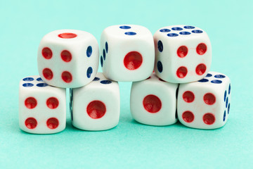 Gaming dices on blue background. Game concept.