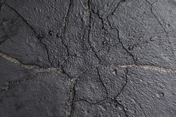 the texture of burned and scorch black polyurethane leather