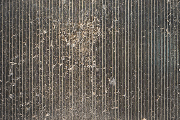 The clogged and dirty vehicle radiator