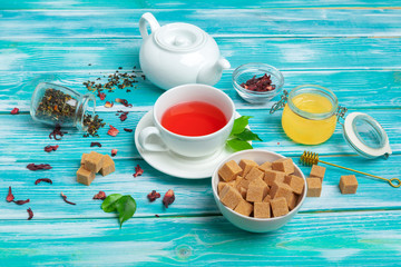 healthy herbal tea over blue background