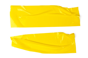 Set of yellow tapes on white background