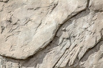 Destroyed concrete wall as background