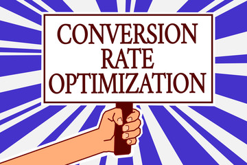 Text sign showing Conversion Rate Optimization. Conceptual photo system for increasing percentage of visitors Man hand holding poster important protest message blue rays background
