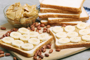 Sandwiches with peanut butter and peanuts