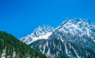 Beautiful  snow covered mountains landscape Kashmir state, India .