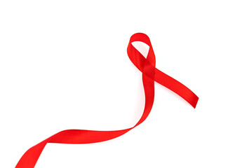 Aids Awareness Red heart Ribbon isolated on white background .